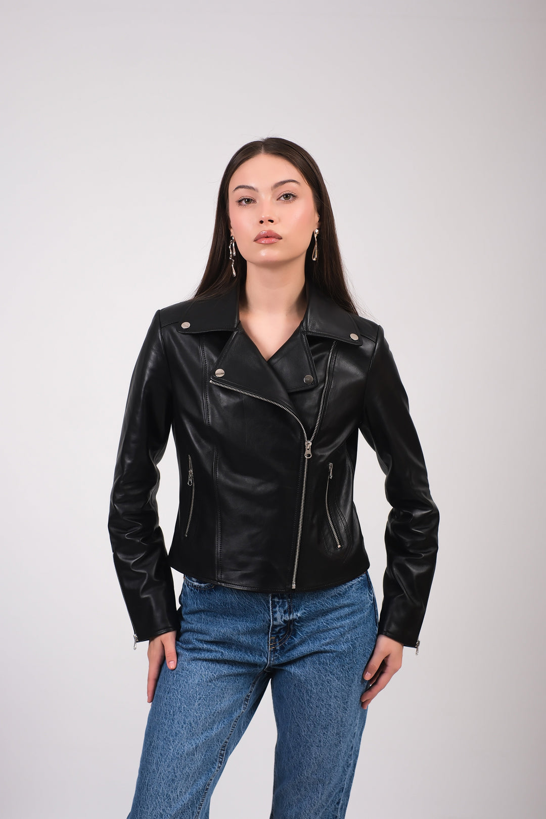 Woman wearing black leather biker jacket