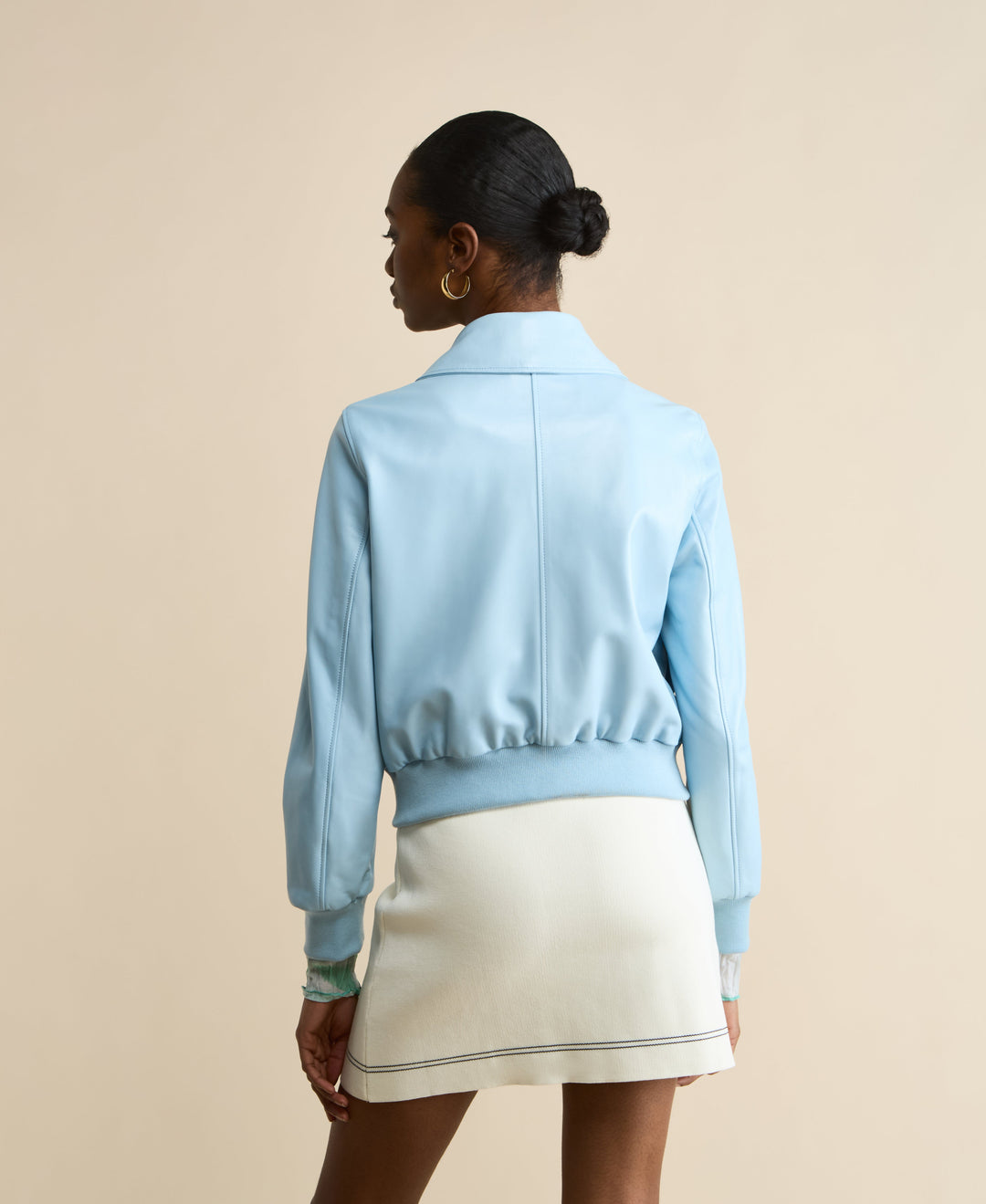 Light blue leather bomber jacket - back view