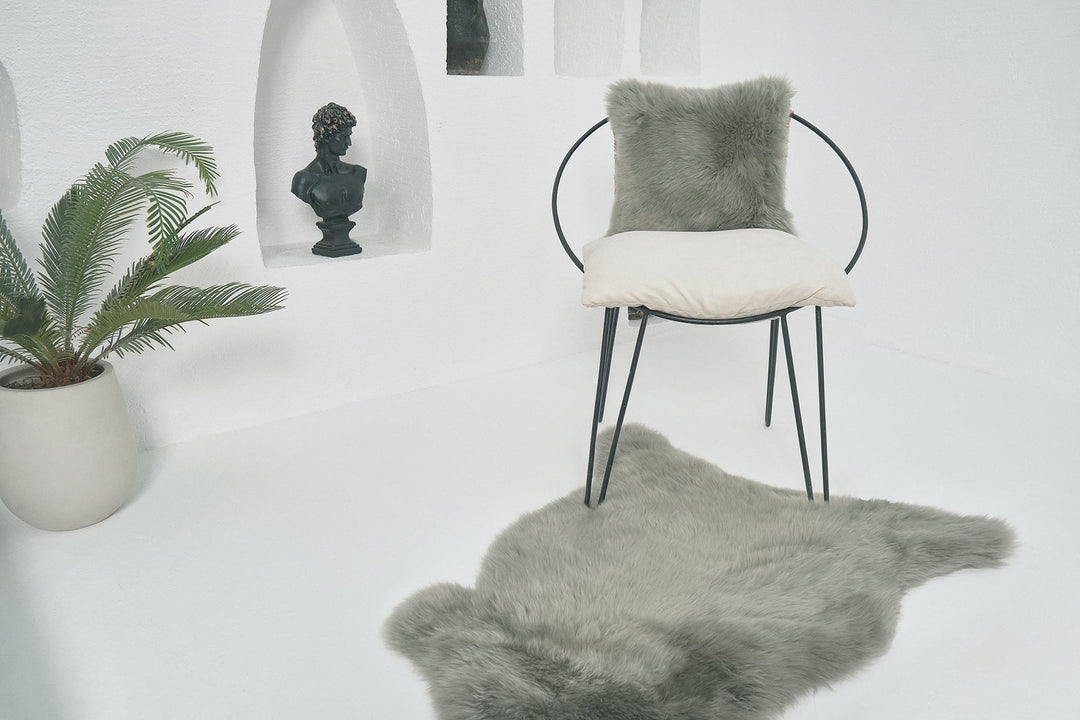 Light green sheepskin rug with chair