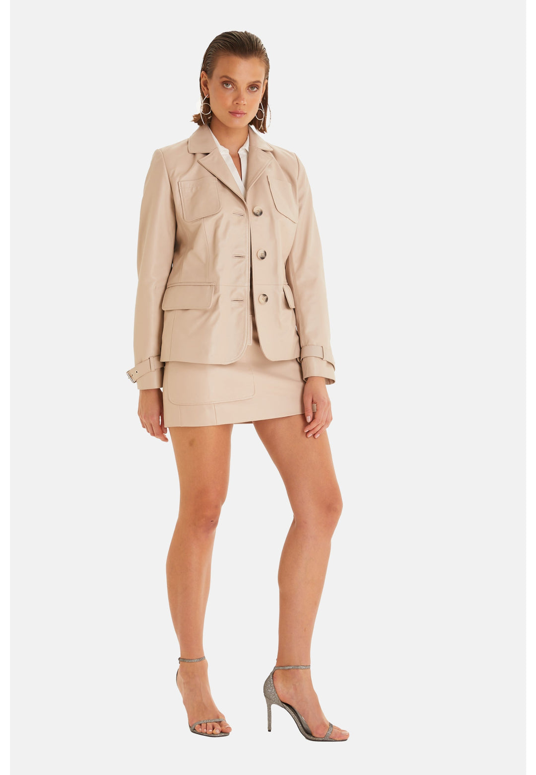 Beige leather blazer with mini skirt