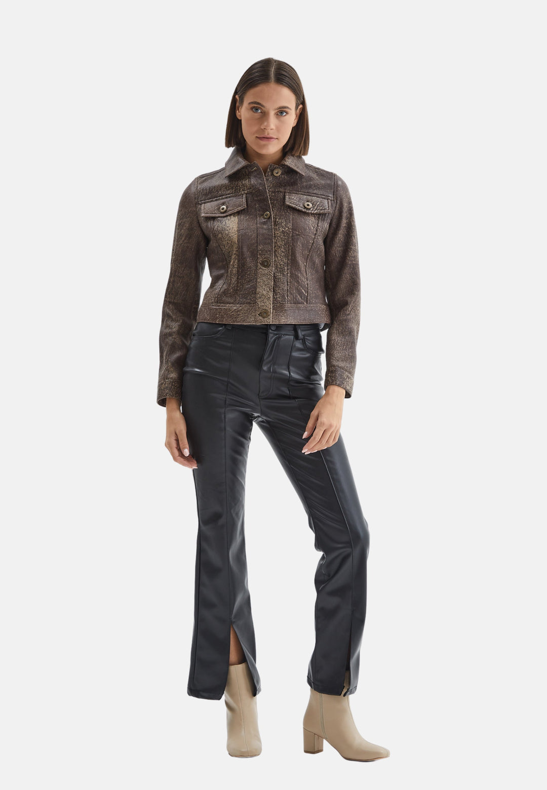 Brown cropped leather jacket on model