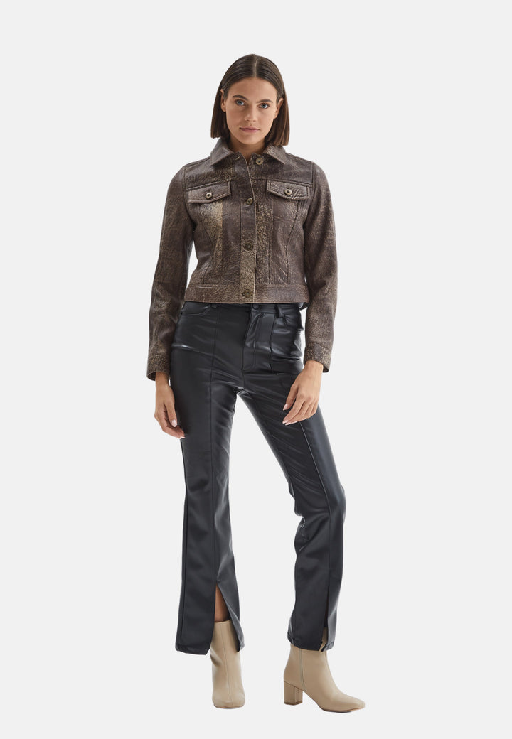 Brown cropped leather jacket on model