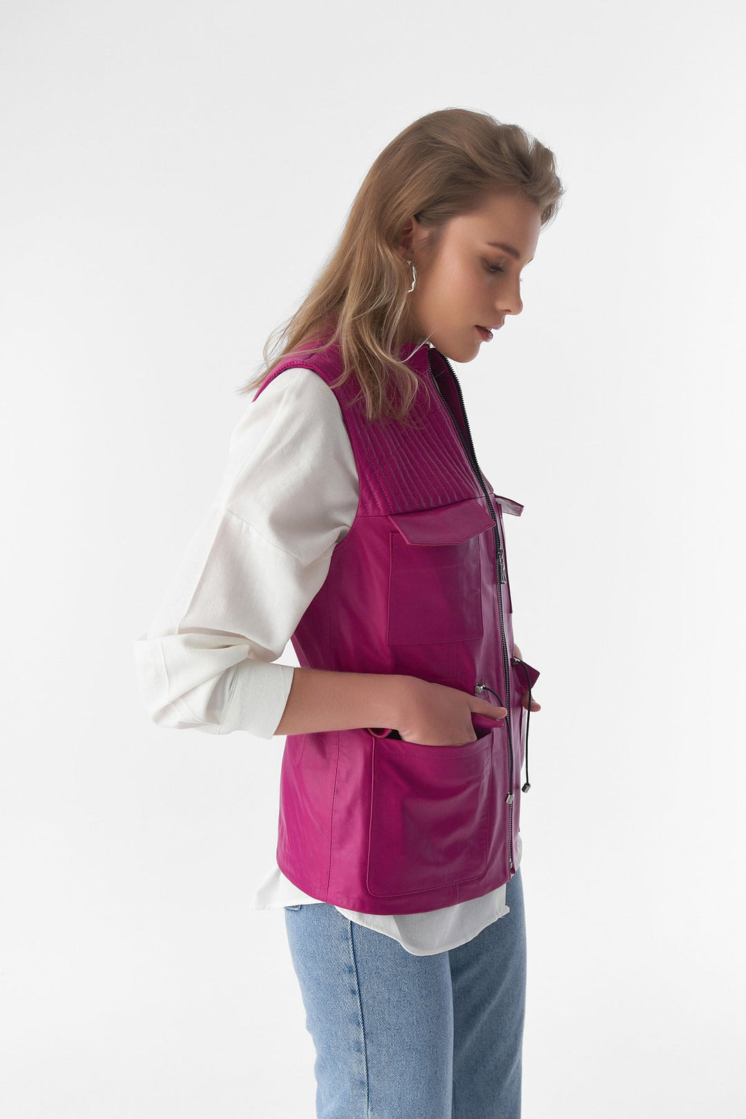 Pink leather vest on model