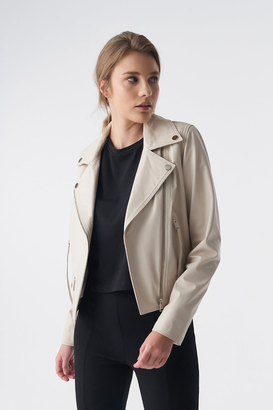 Woman wearing beige leather jacket