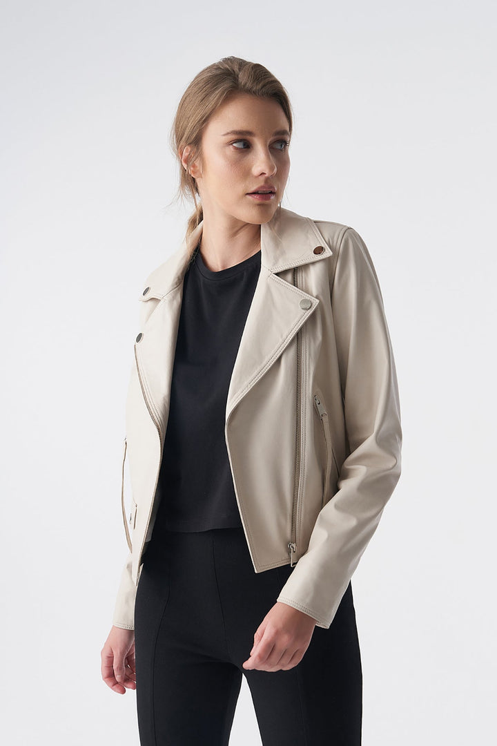 Woman wearing beige leather jacket