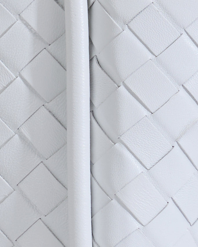 White woven leather bag close-up