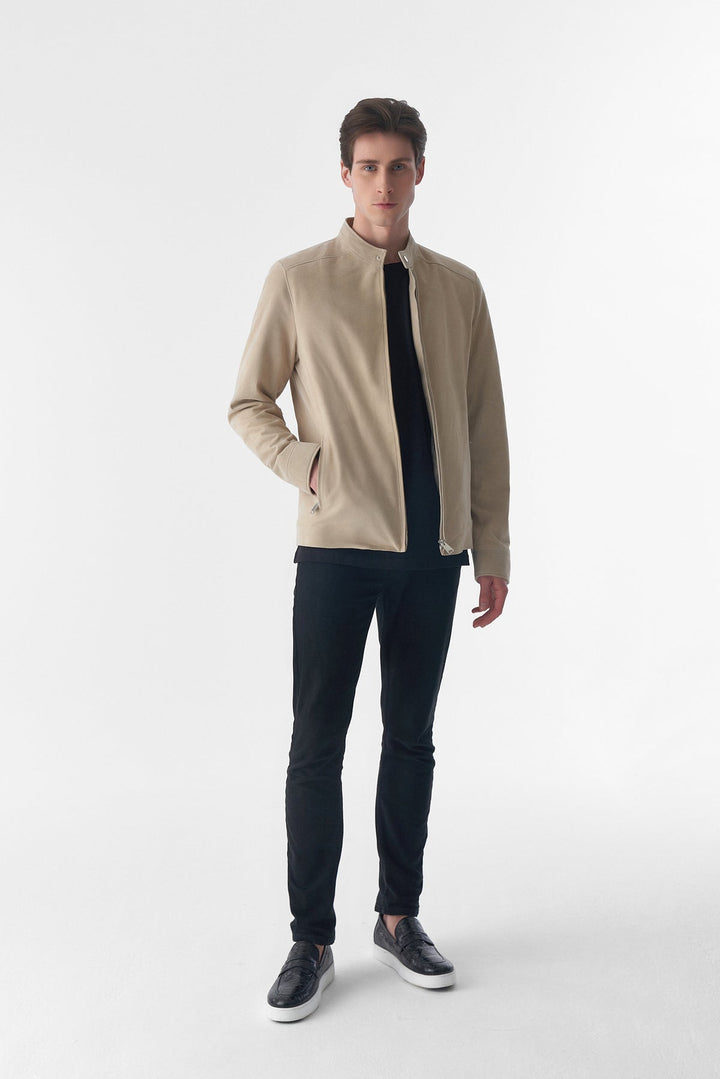 Man wearing beige suede jacket