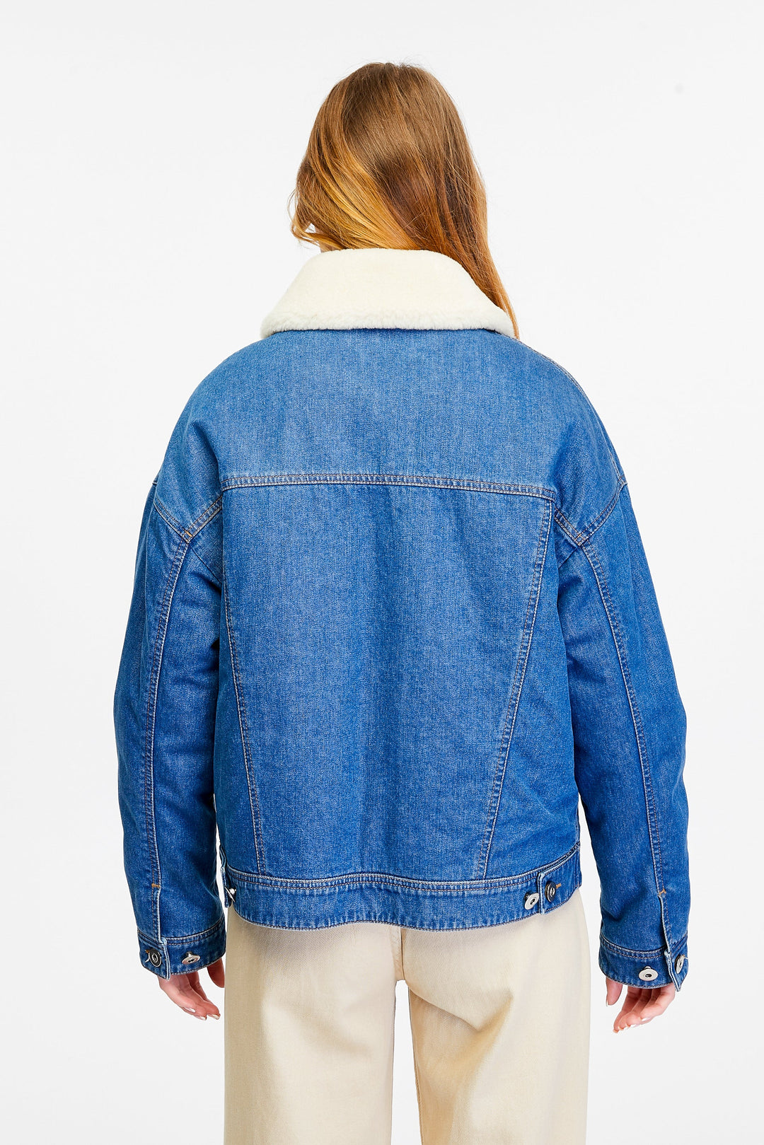 Blue denim jacket with white sherpa collar