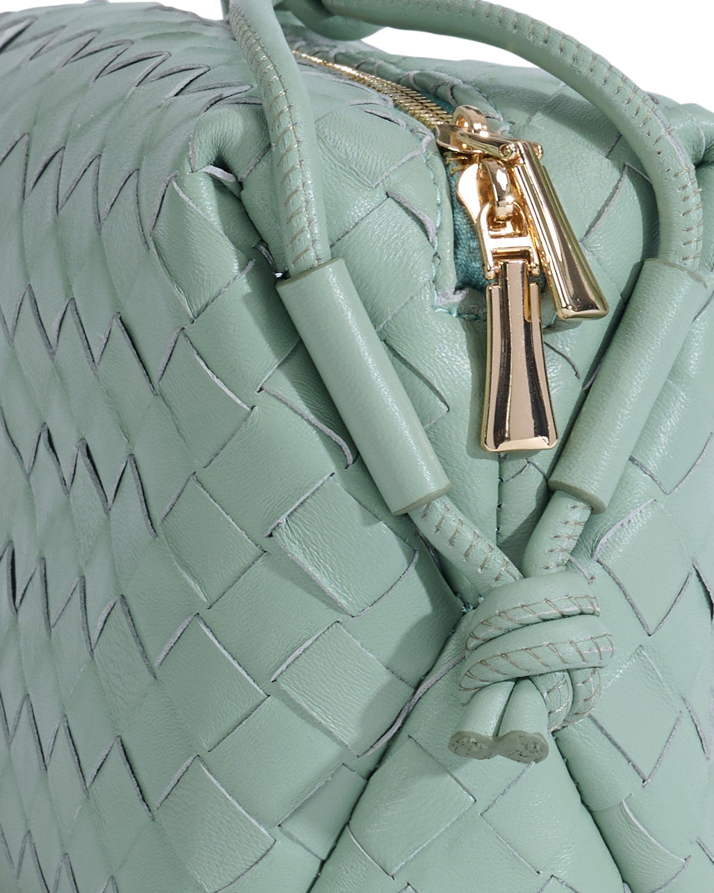 Pastel green woven leather crossbody bag