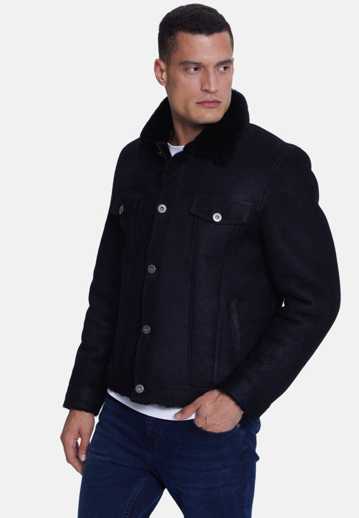 Man wearing black suede shearling jacket