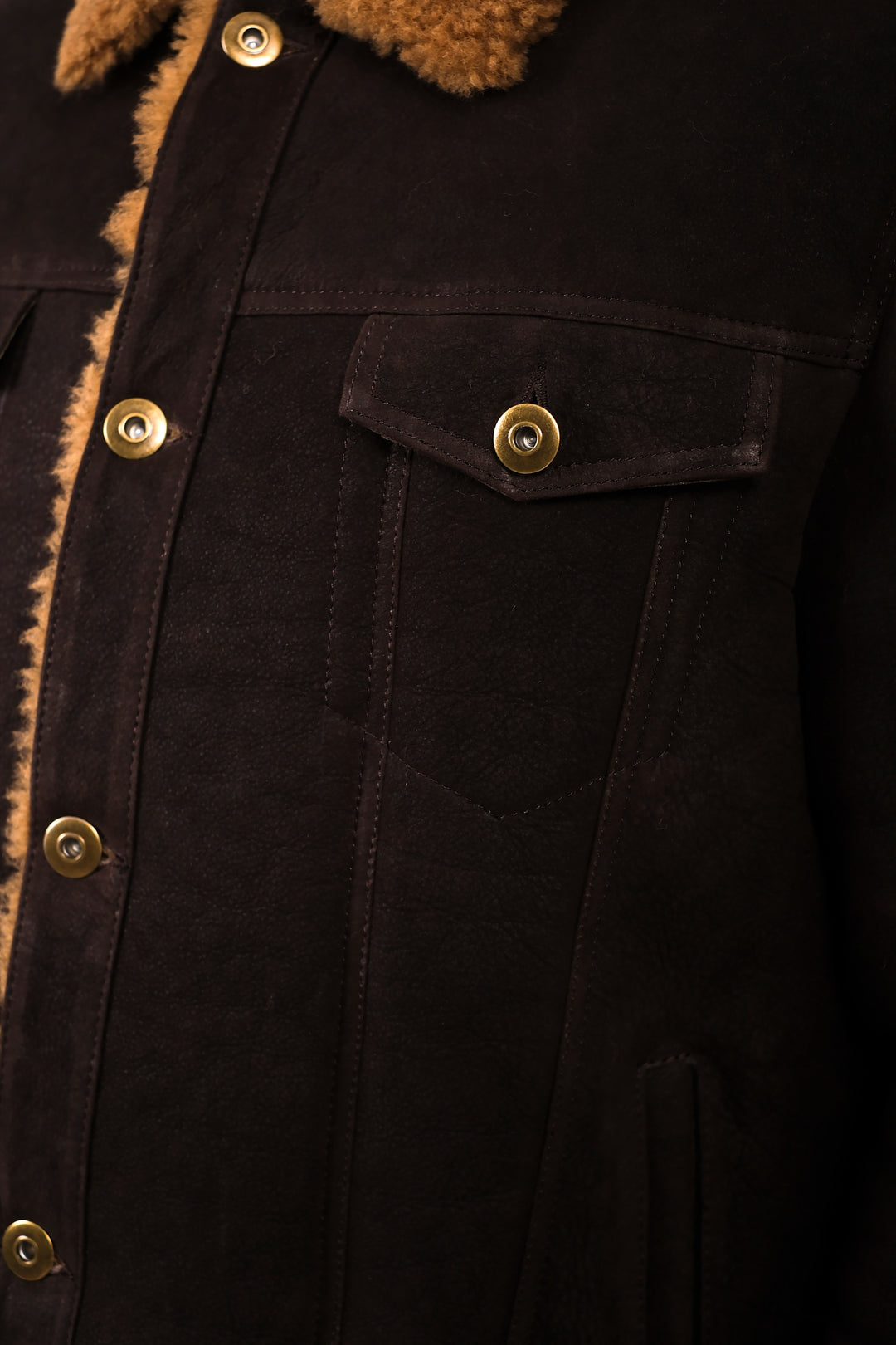 Dark brown shearling jacket close-up