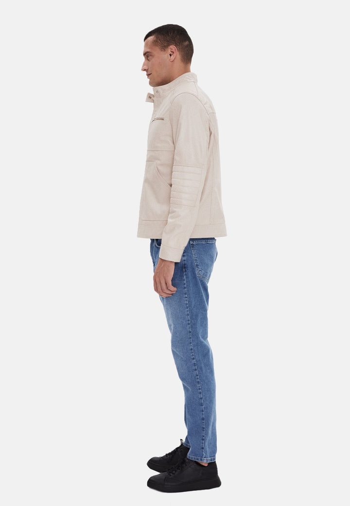 Side view beige leather jacket on model