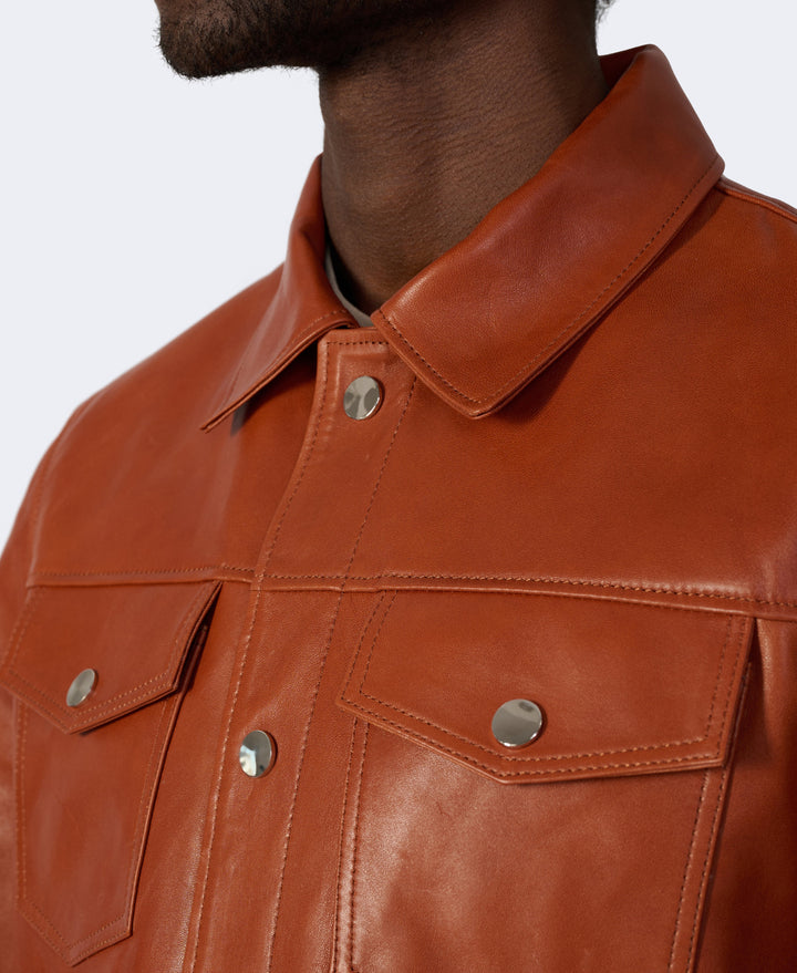 Brown leather jacket chest close-up