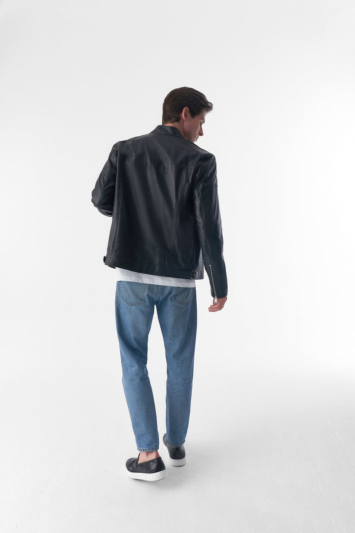 Man wearing black leather jacket