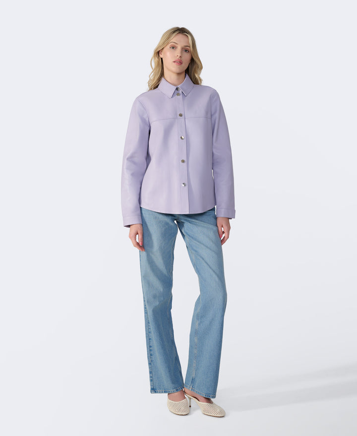 Woman wearing lilac leather shirt jacket