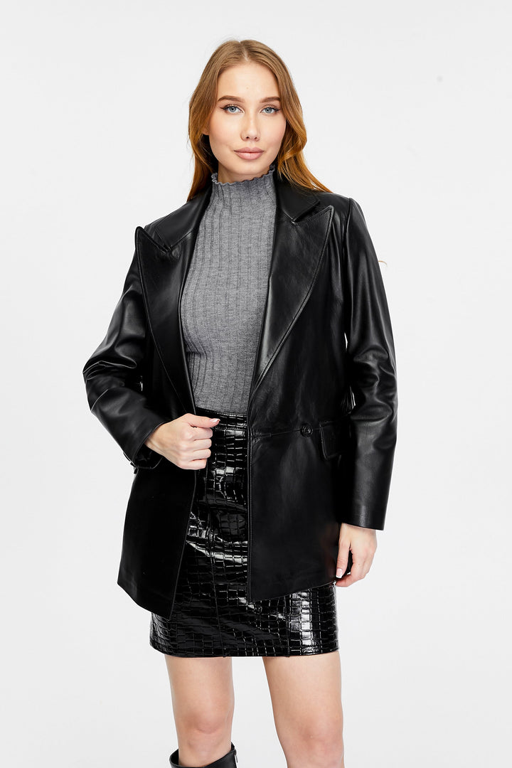 Woman wearing black leather blazer