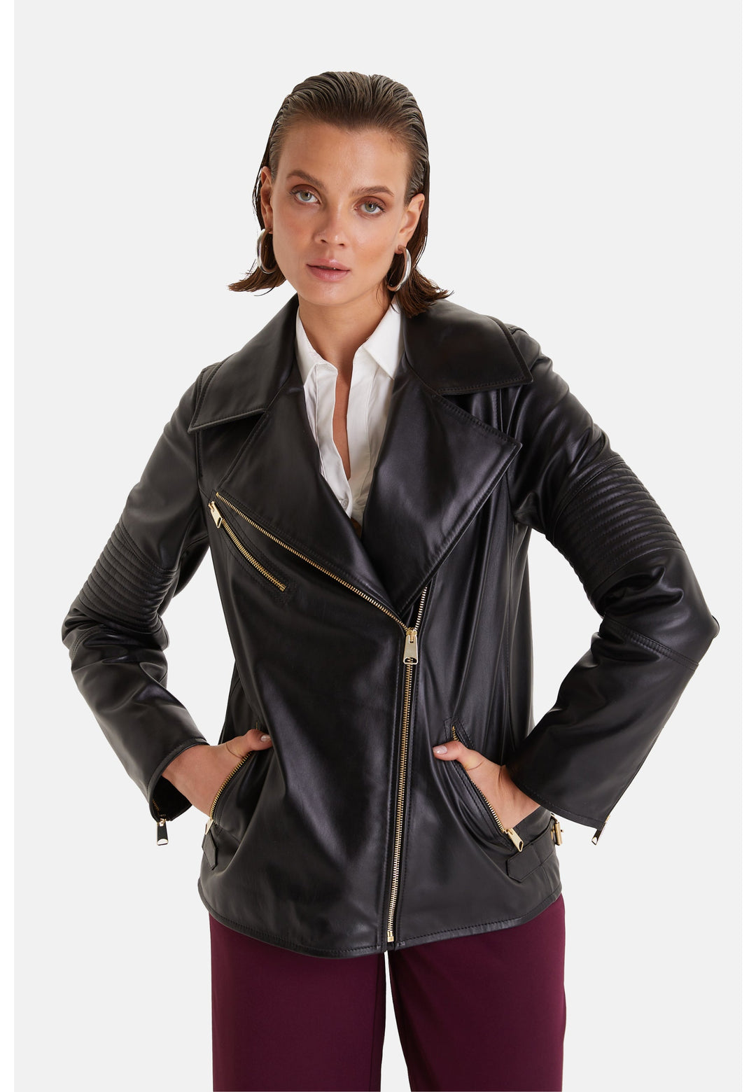 Woman wearing black leather biker jacket