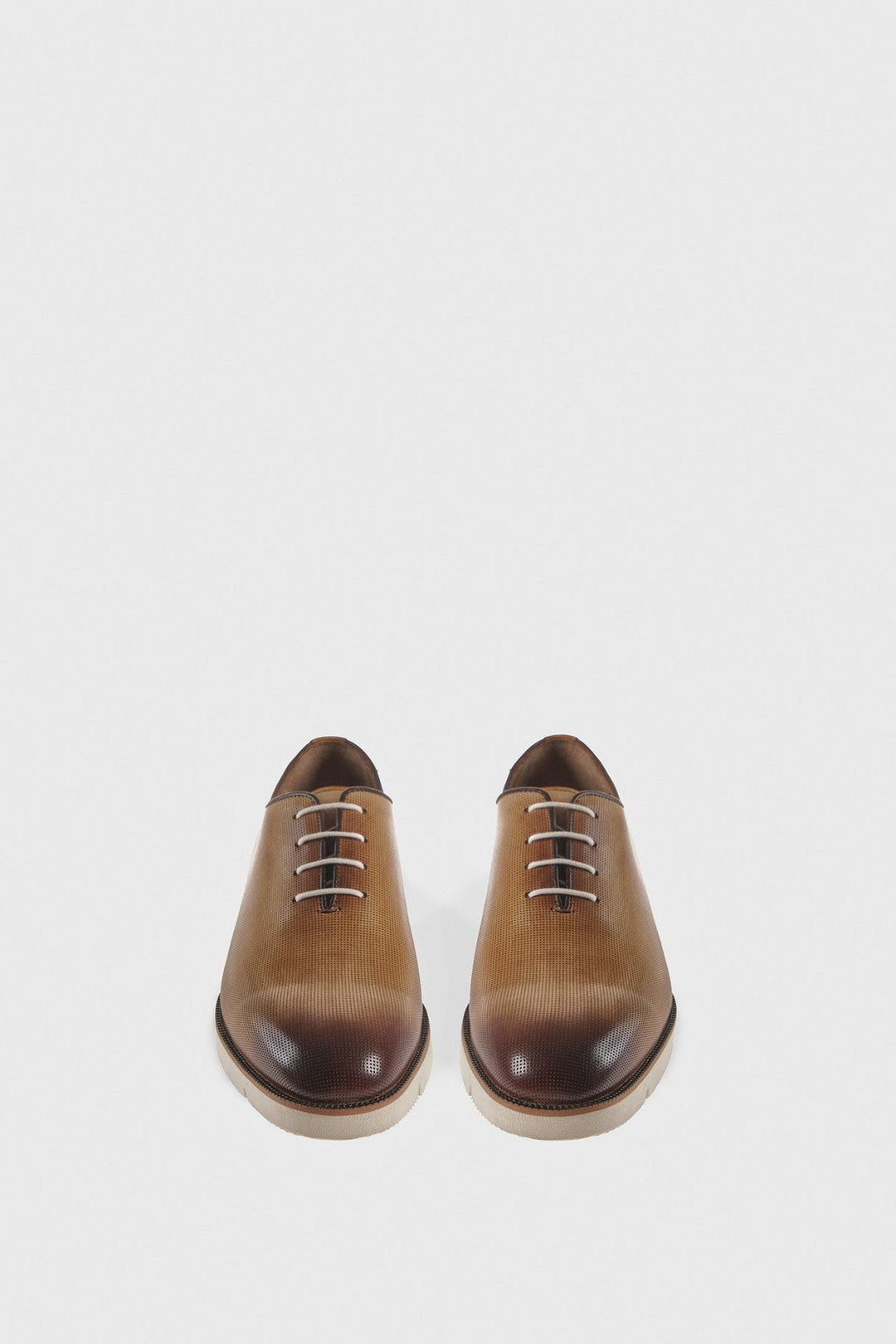 Pair of tan leather men's shoes