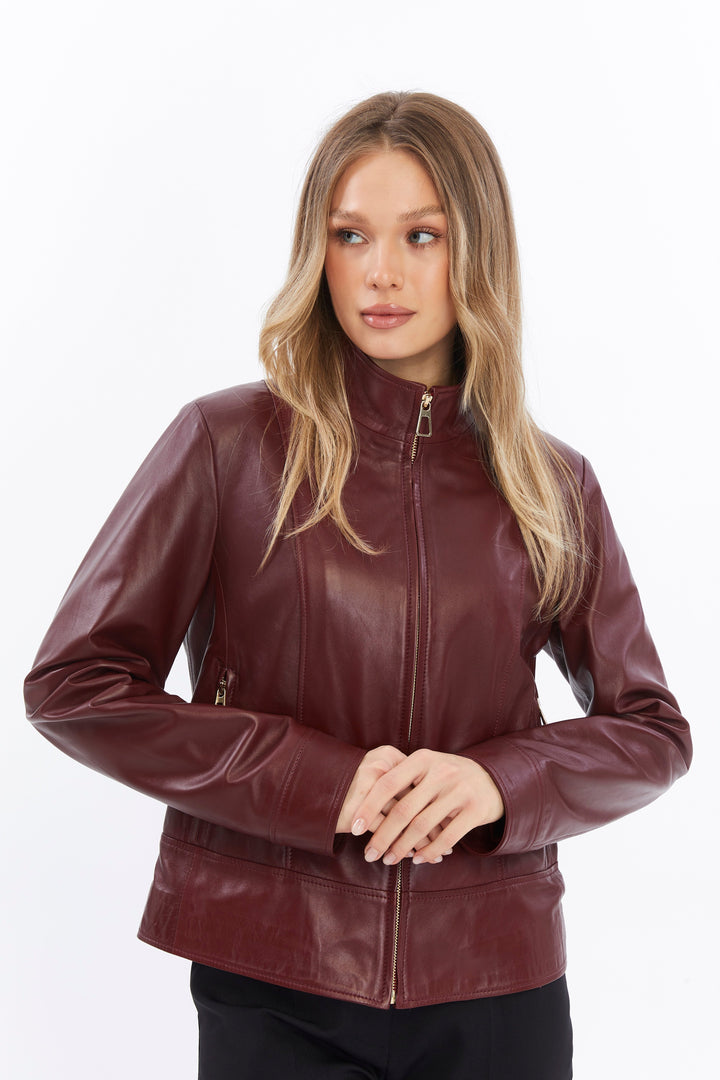 Woman wearing burgundy leather jacket