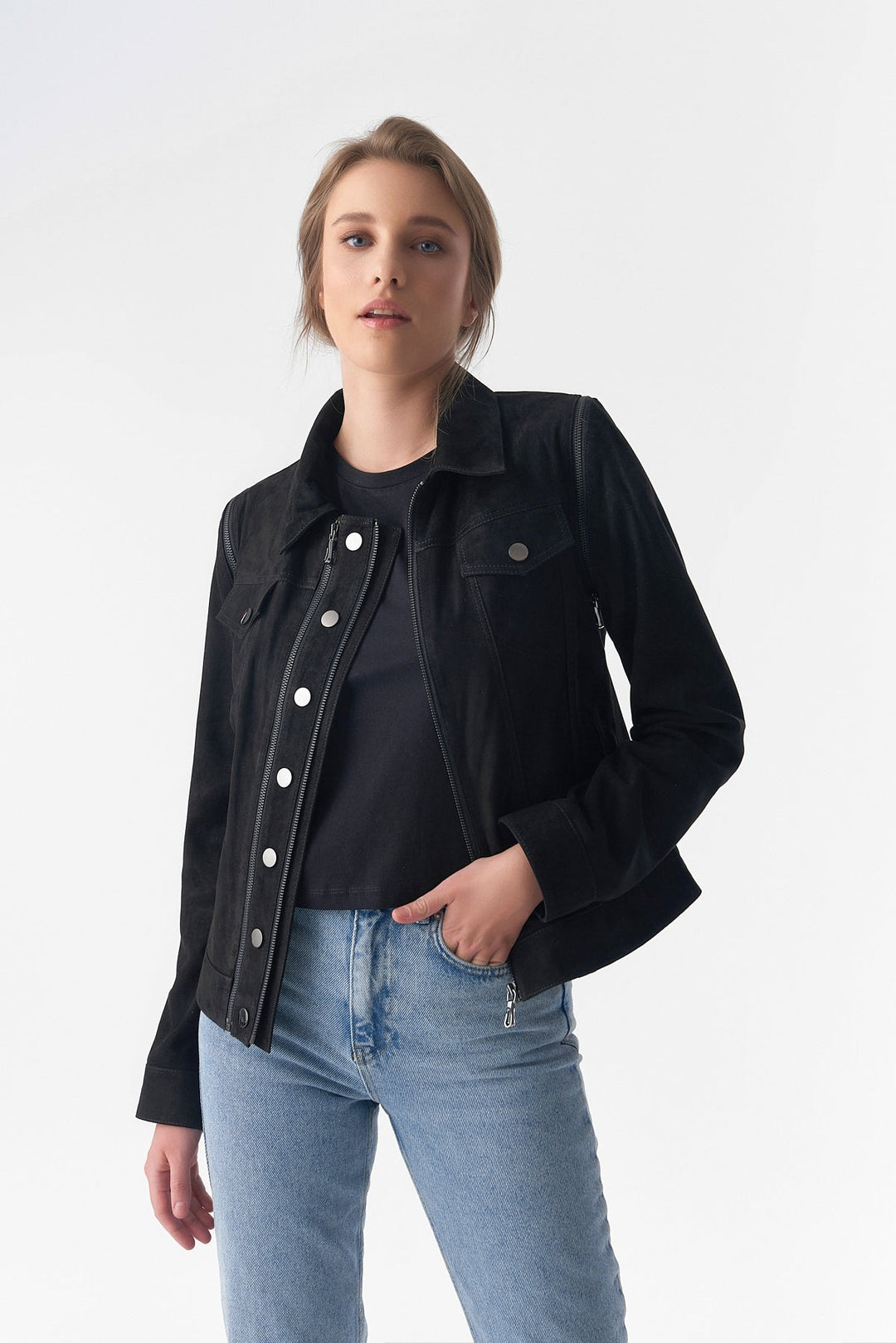 Woman wearing black suede jacket