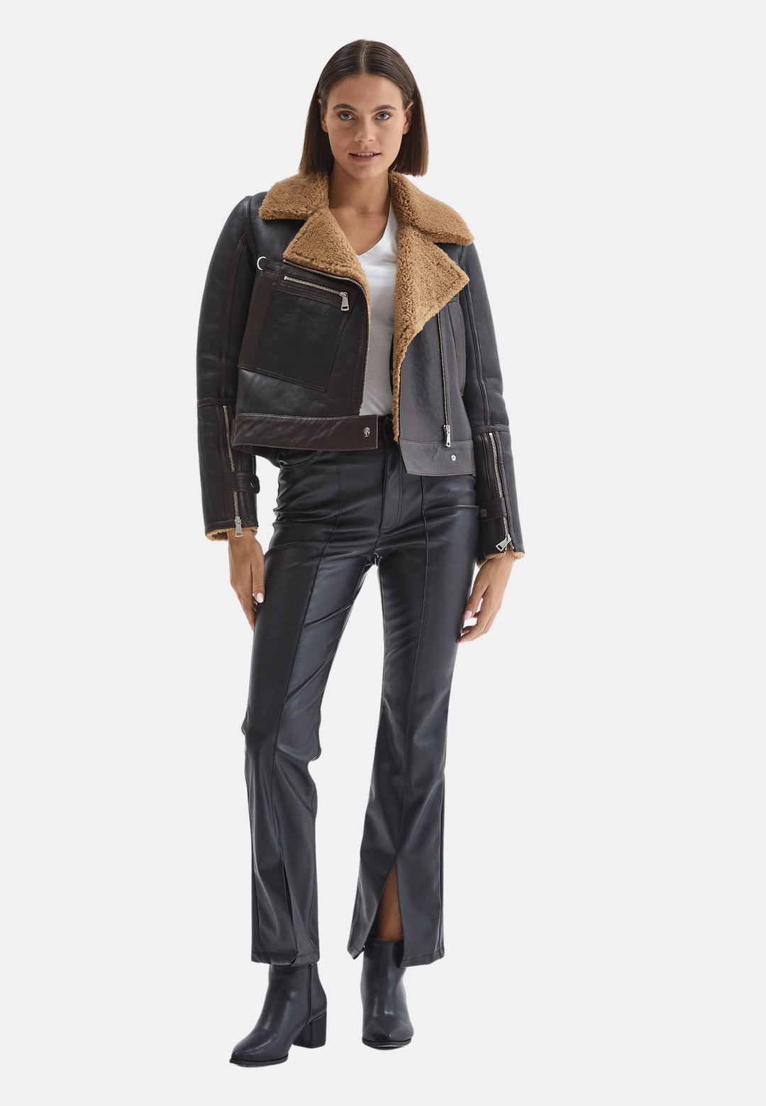 Woman wearing black shearling jacket