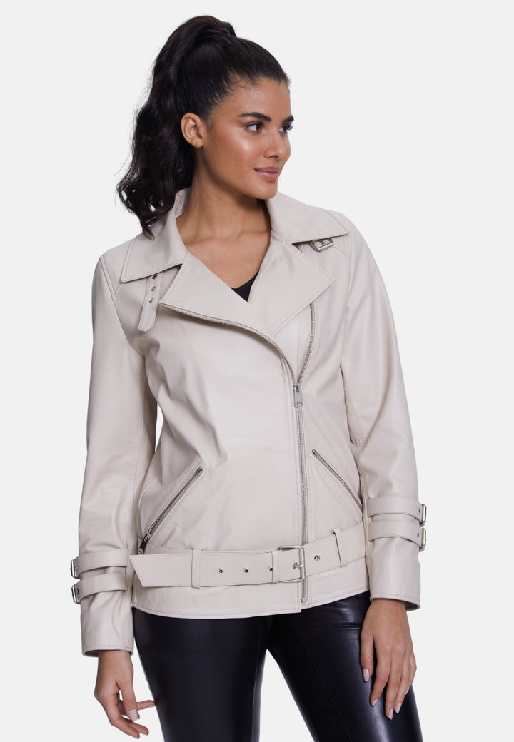 Woman wearing beige leather biker jacket