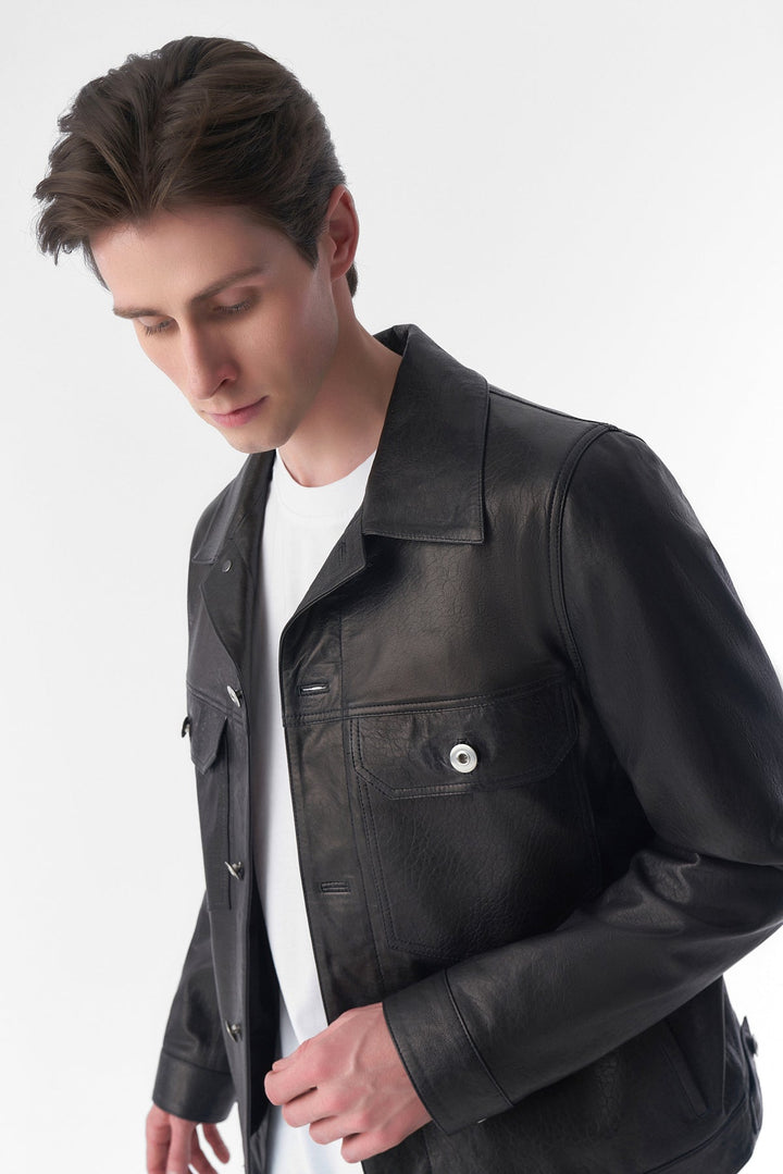 Man wearing black leather jacket