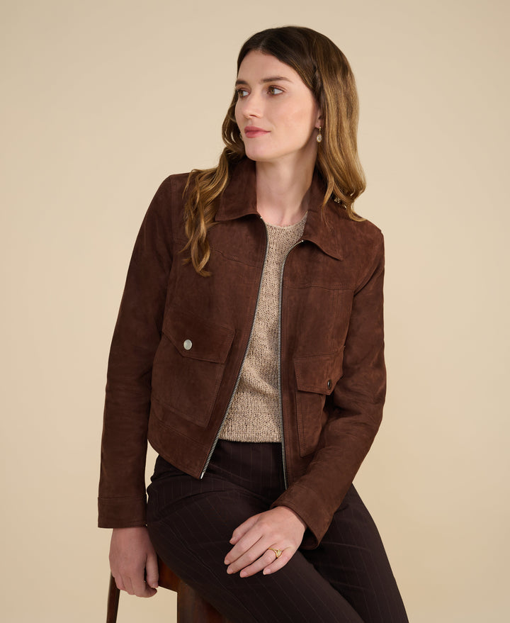 Model wearing brown suede jacket