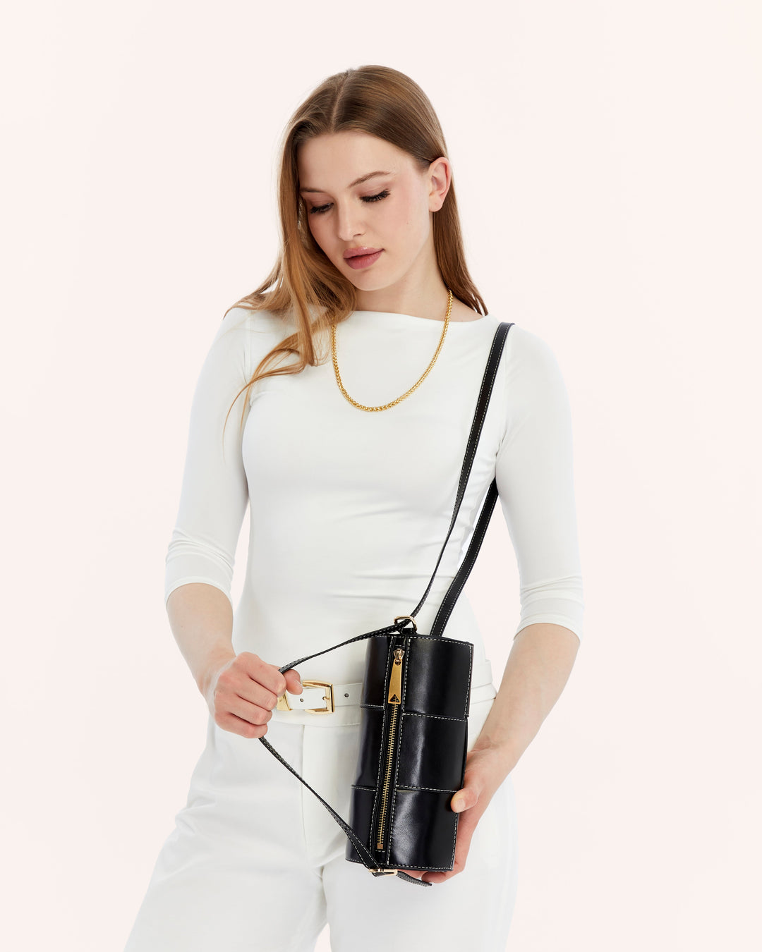 Black woven leather crossbody handbag