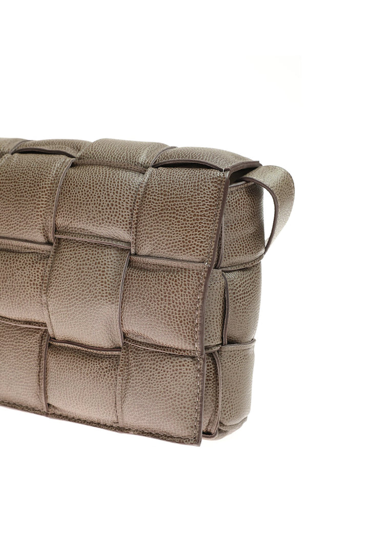 Pebbled leather woven handbag corner