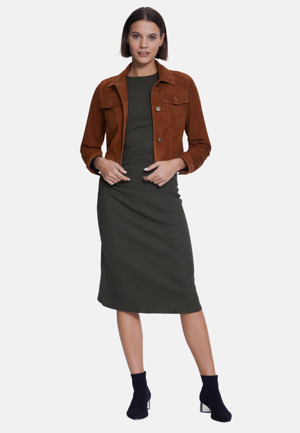 Woman wearing brown suede jacket