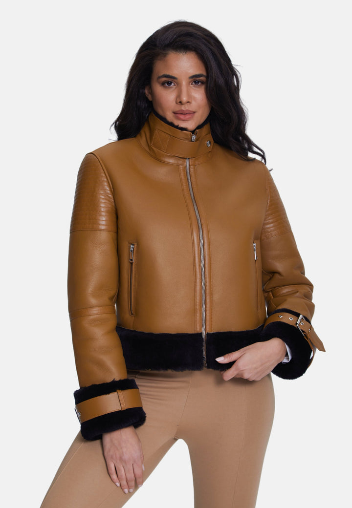 Woman wearing brown sheepskin jacket