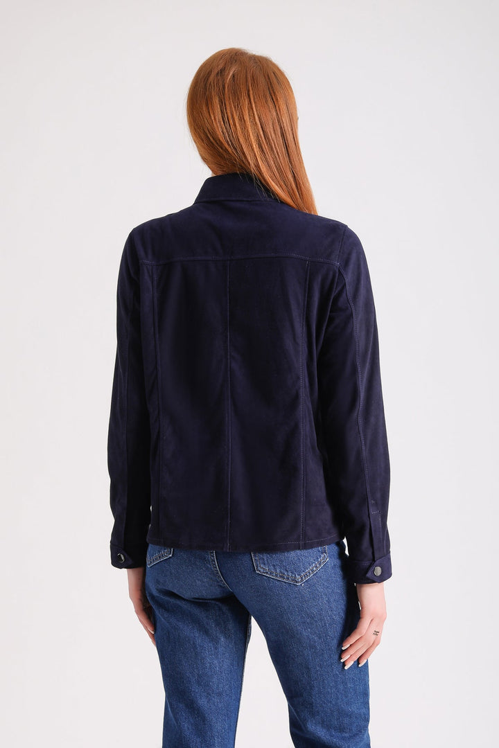 Female model wearing navy suede shirt
