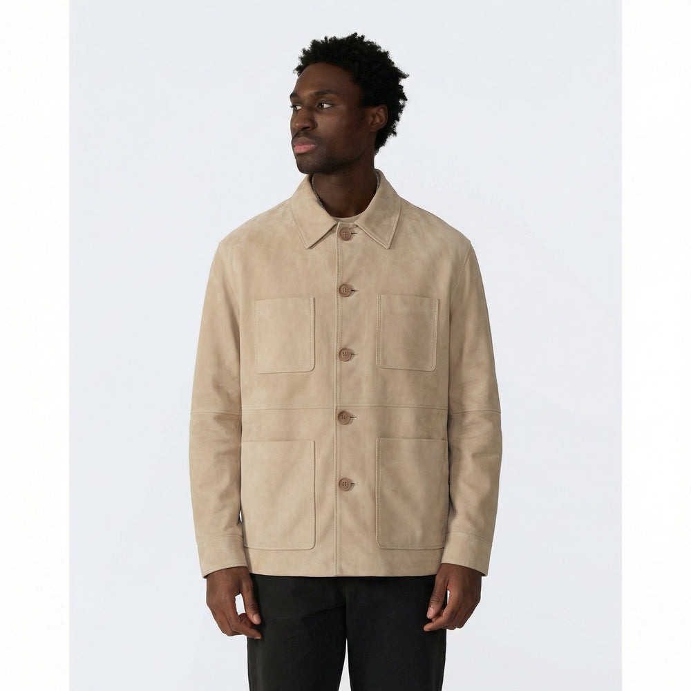 Man wearing a beige jacket on a white background