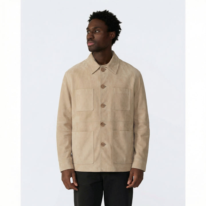 Man wearing a beige jacket on a white background