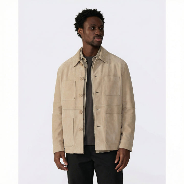 Man wearing a beige jacket on a white background