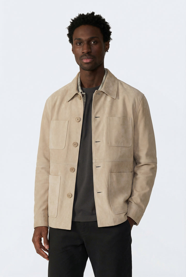 Man wearing a beige jacket on a white background
