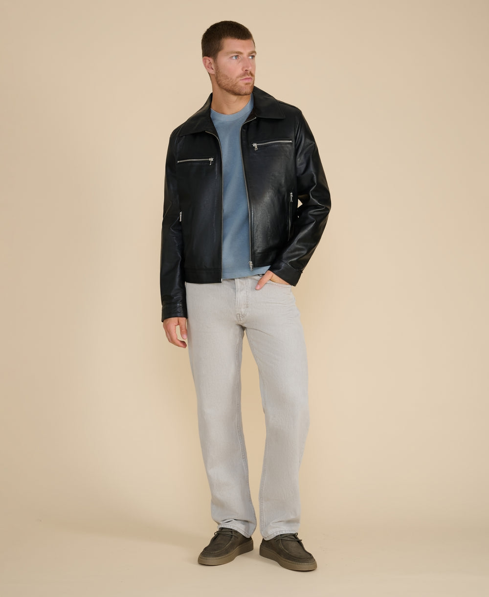 Men’s black nappa leather jacket full length front view with zip pockets