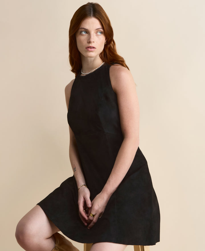 Women’s black suede dress styled for elevated modern dressing