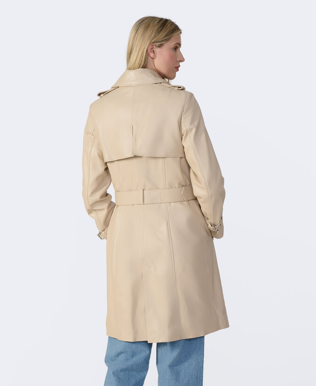 Beige trench coat back view