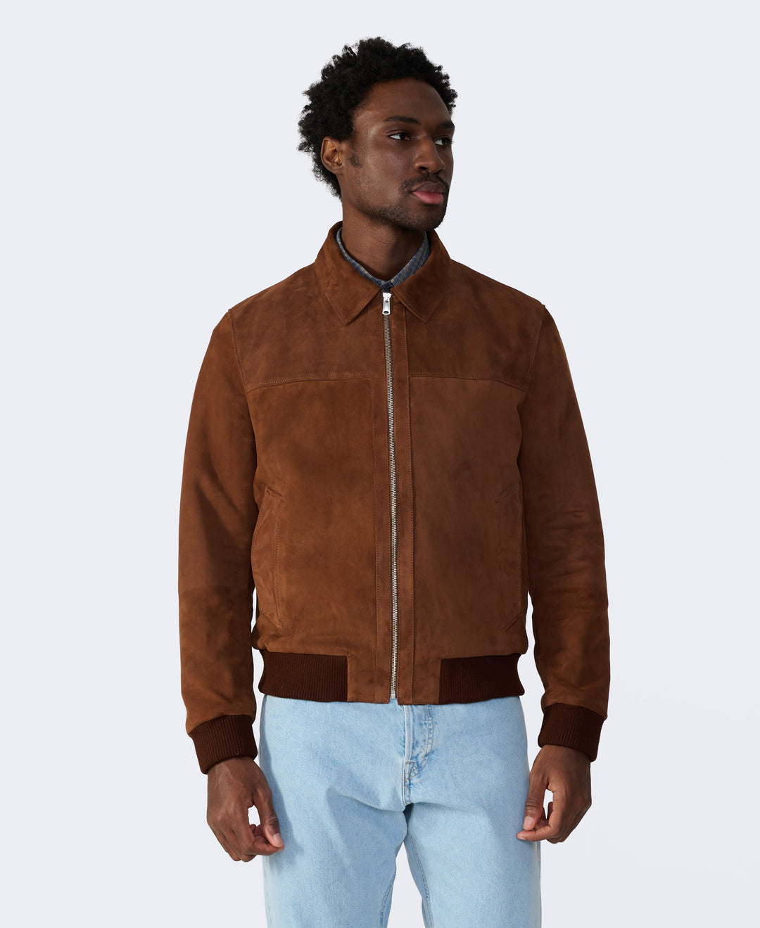 Brown suede bomber jacket on model