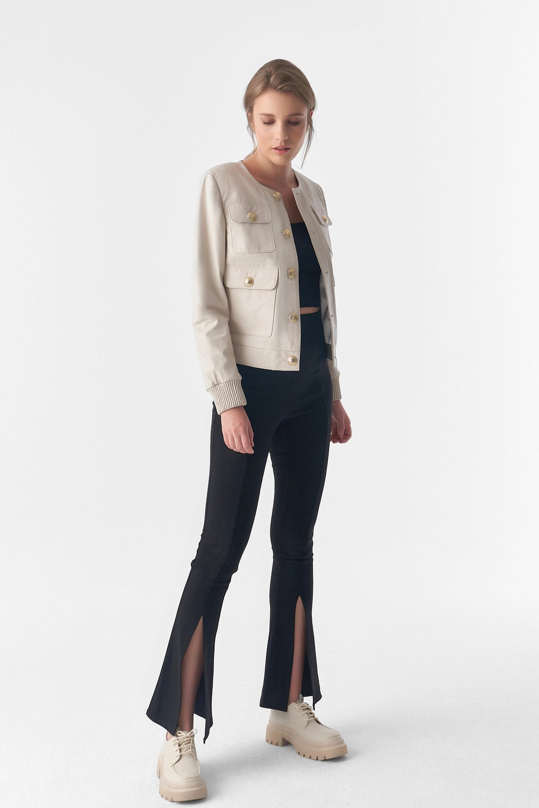 Beige cropped leather jacket on model