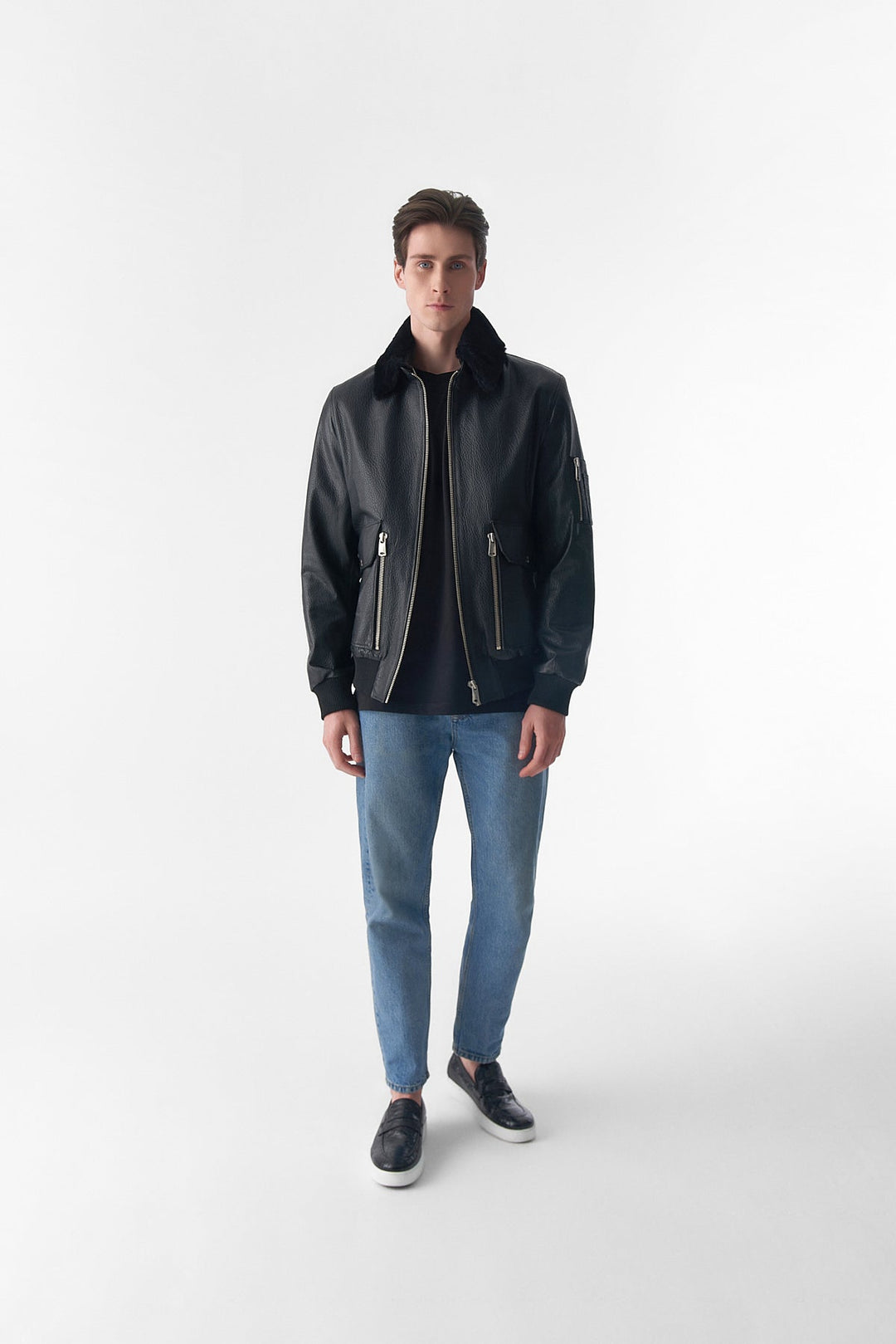 Man wearing black leather jacket