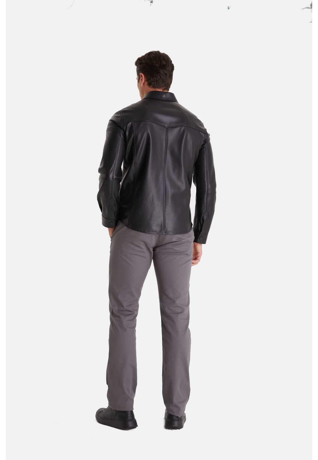 Man wearing black leather jacket (back)