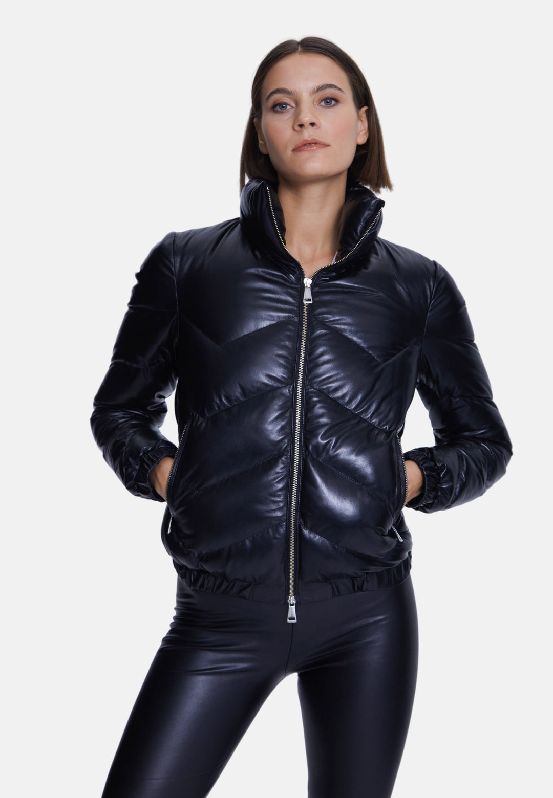 Woman wearing black glossy puffer jacket