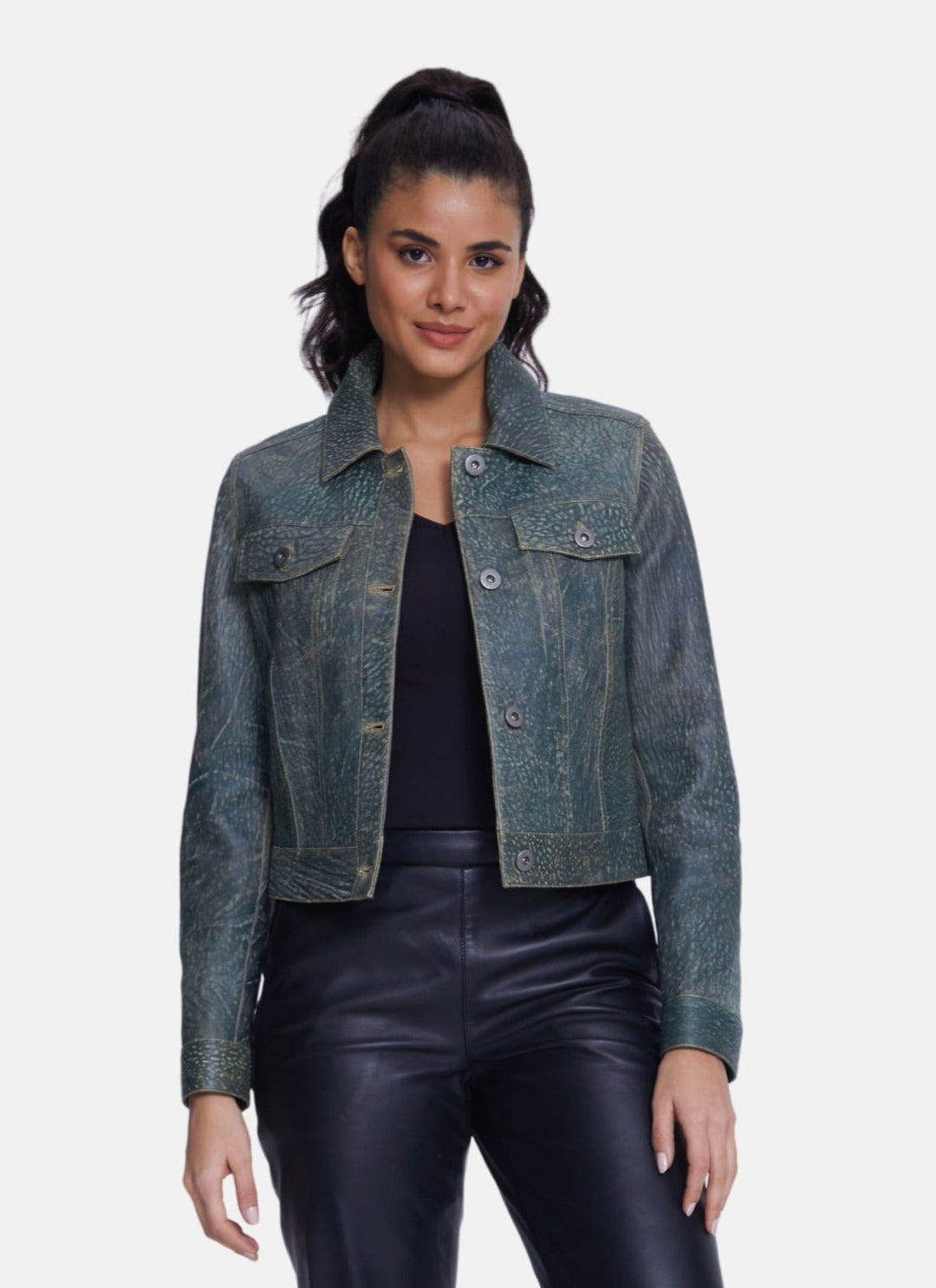 Woman wearing green cropped leather jacket