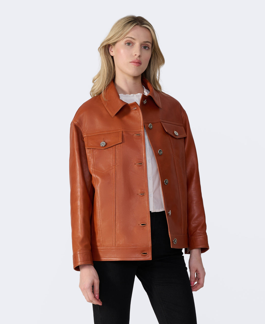 Tan leather shirt jacket on model