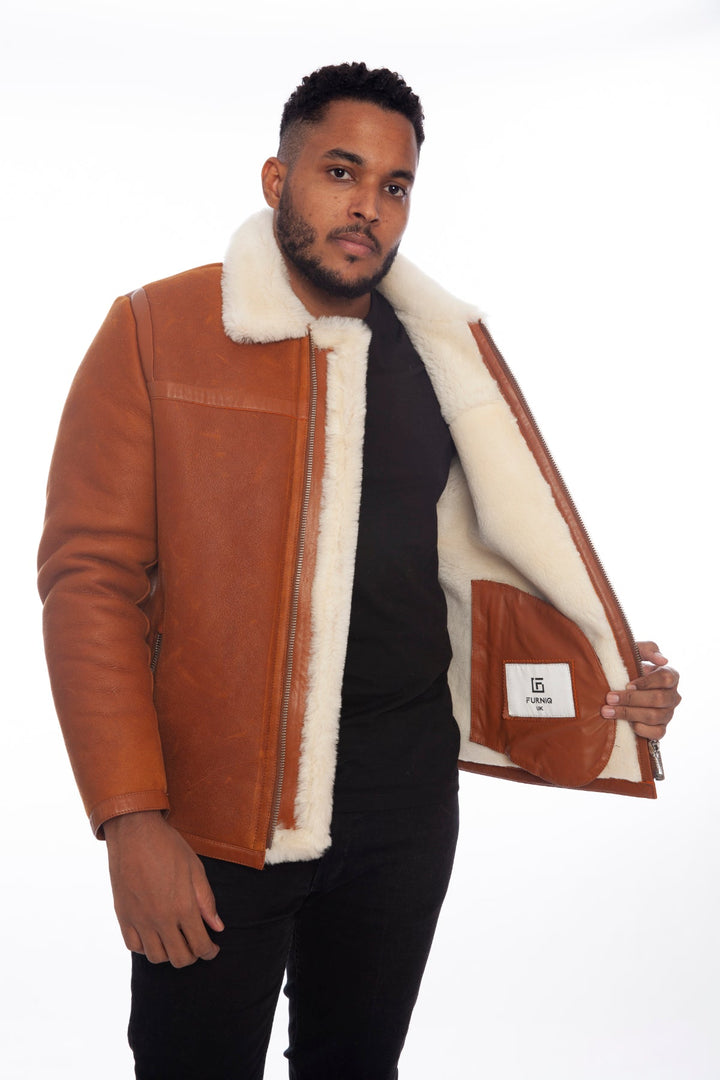 Man wearing brown shearling jacket