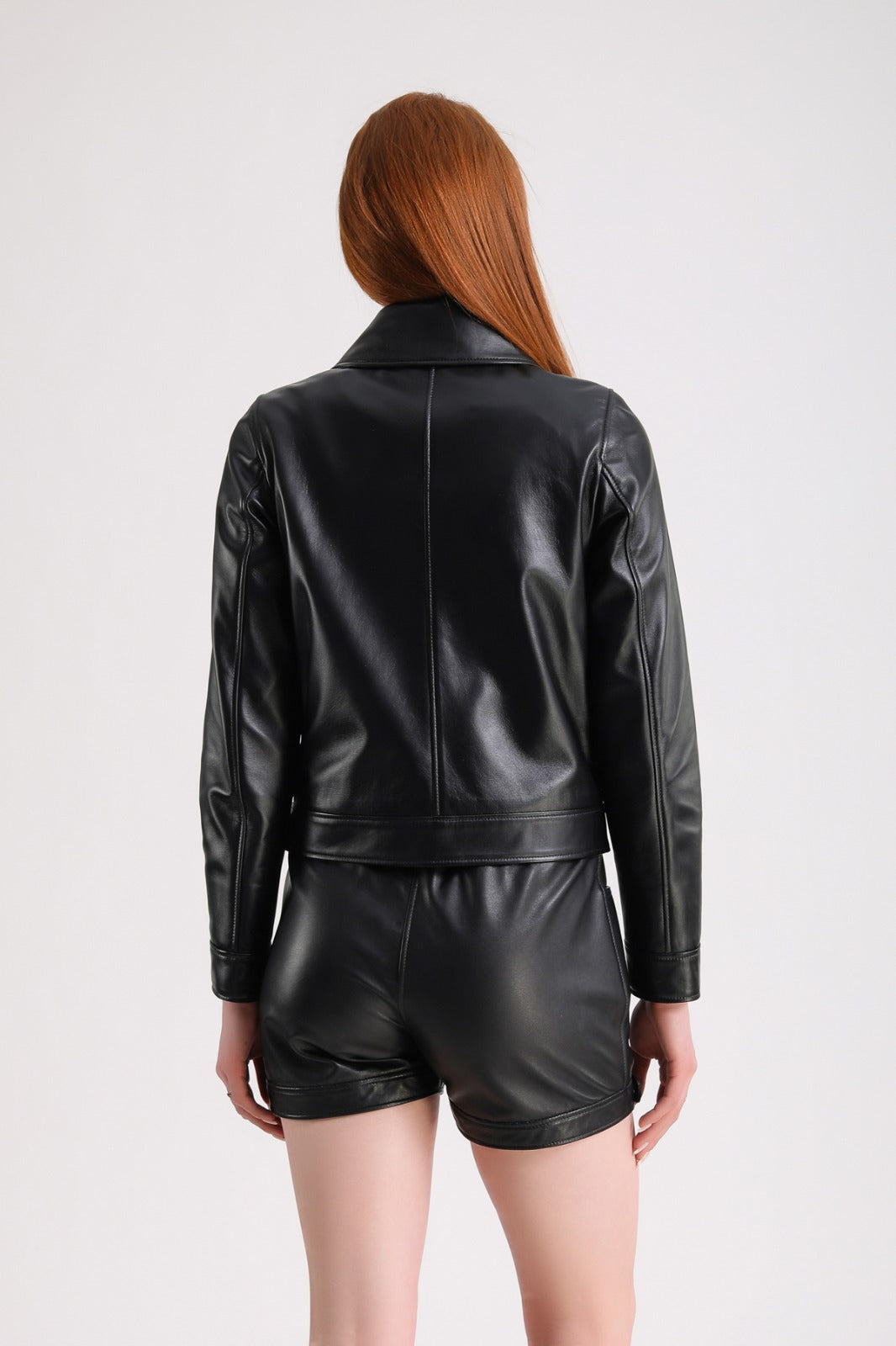 Back view black leather jacket