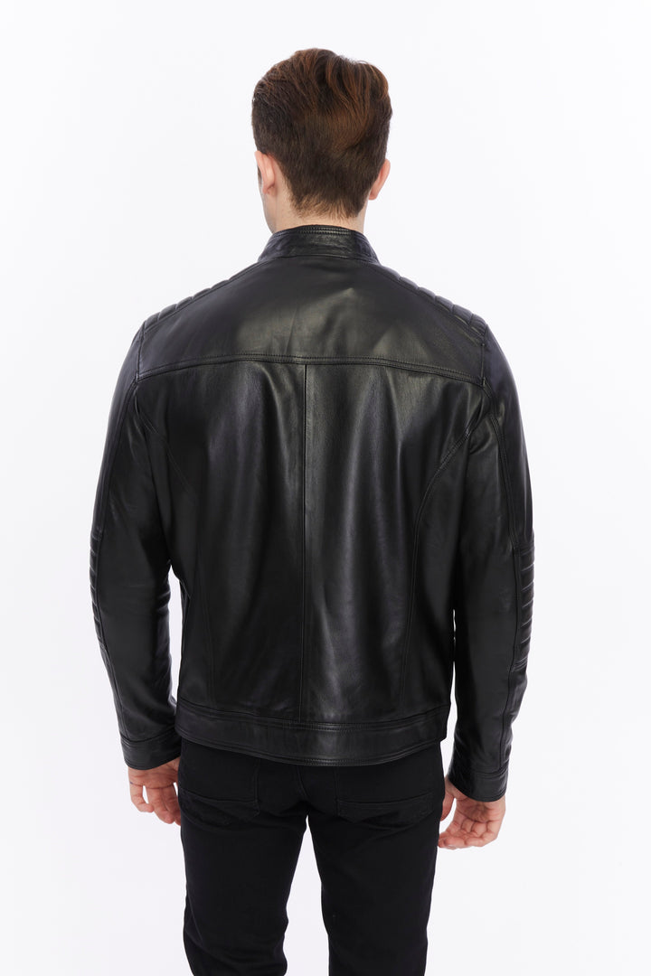 Back view of man wearing black leather jacket
